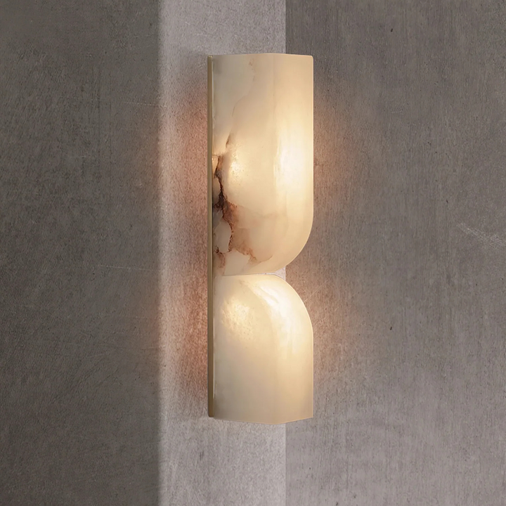Sculptural wall lamp in alabaster with accents in Japandi brass