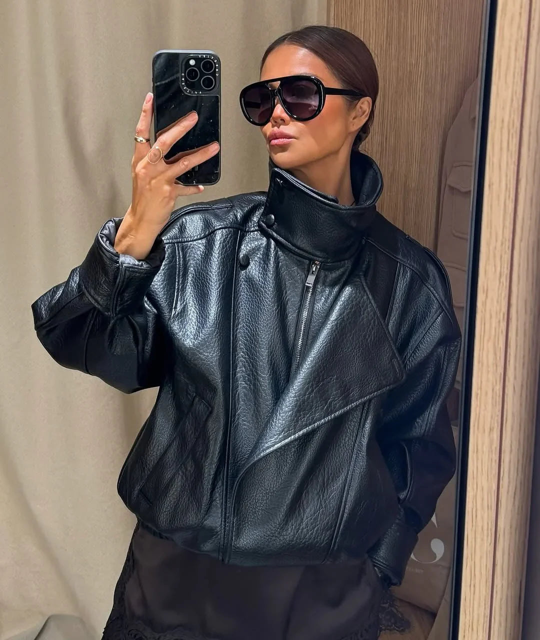 Daniela - Women's black faux leather jacket with stand-up collar | loose fit with zip