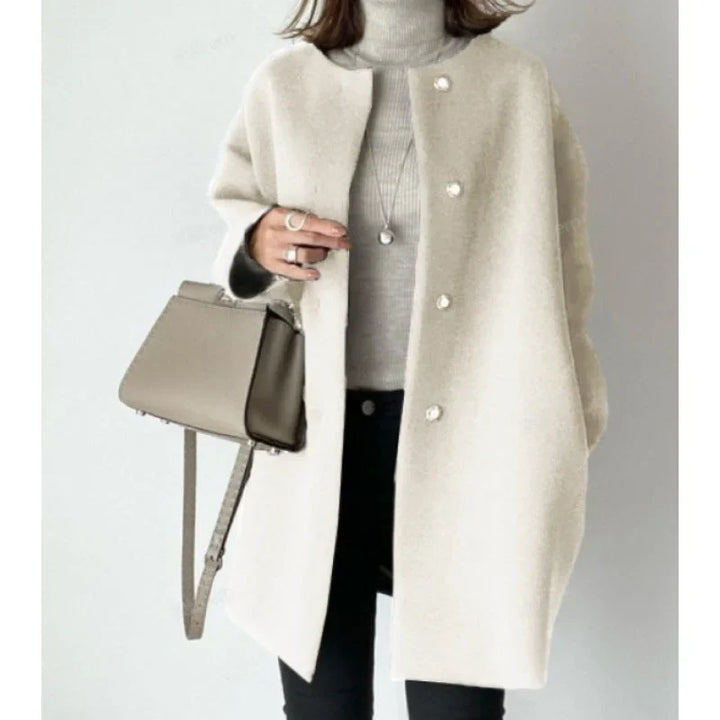 Xandra - Chic women's coat with buttons and modern style