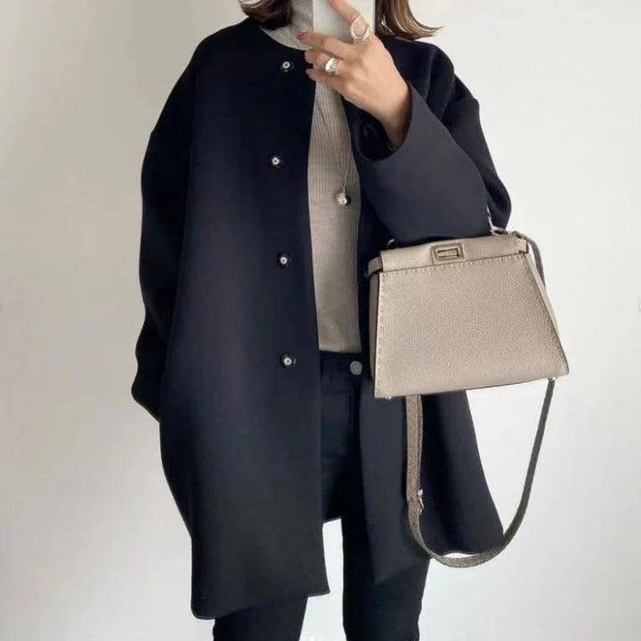 Xandra - Chic women's coat with buttons and modern style