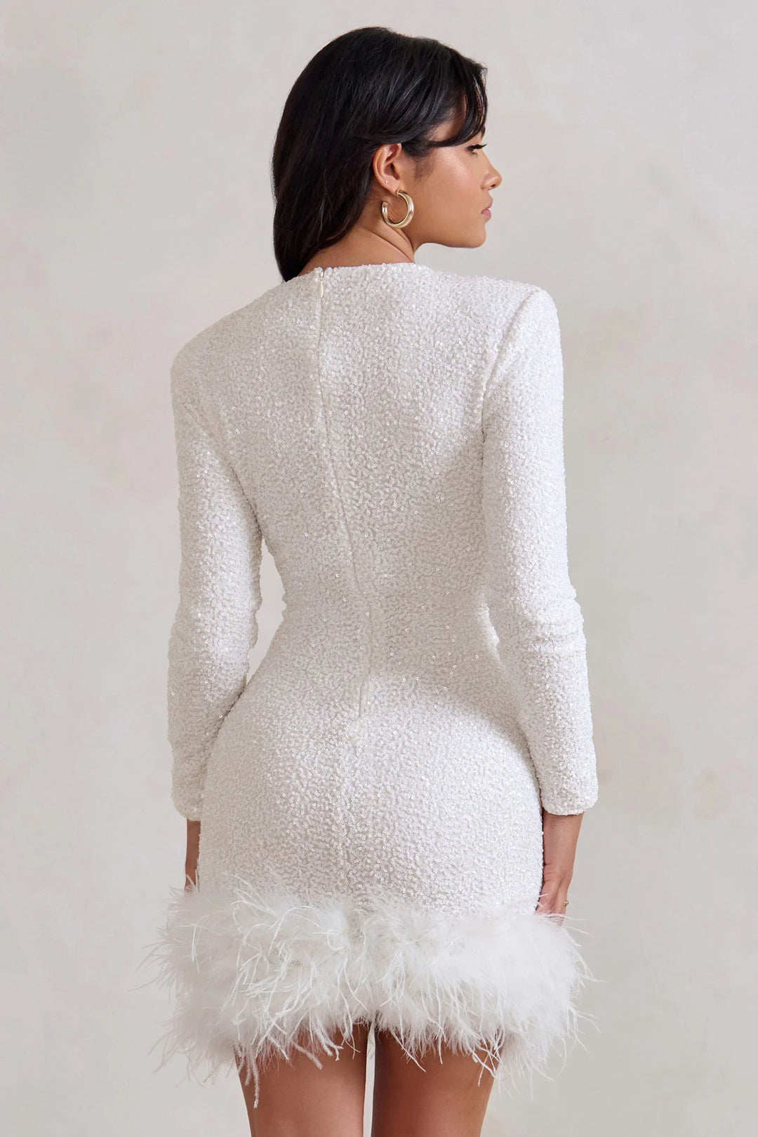 Lucy - Women's short evening dress with feather hem and long sleeves