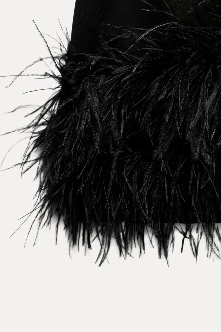 Lucy - Women's short evening dress with feather hem and long sleeves