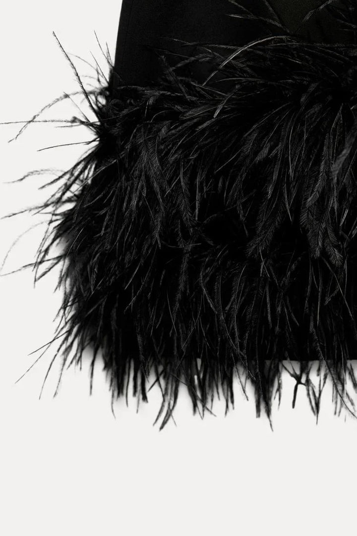 Lucy - Women's short evening dress with feather hem and long sleeves