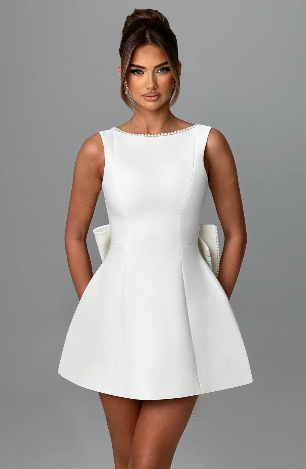 Georgia - Women's short dress with decorative bow at the back