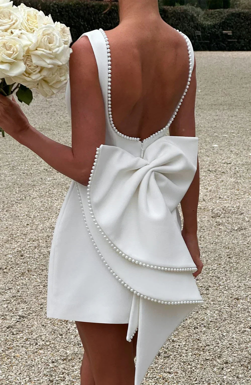 Georgia - Women's short dress with decorative bow at the back