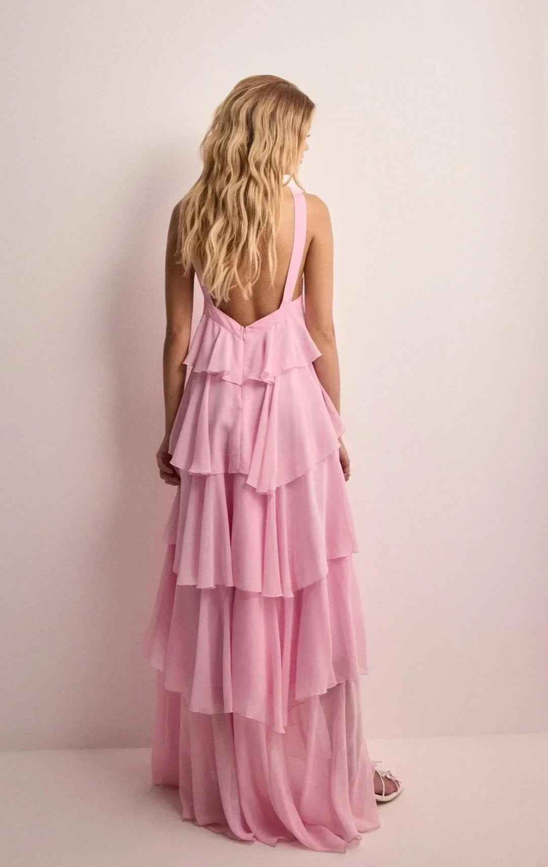 Kyla - Long pink dress with halter neck and floral ruffles