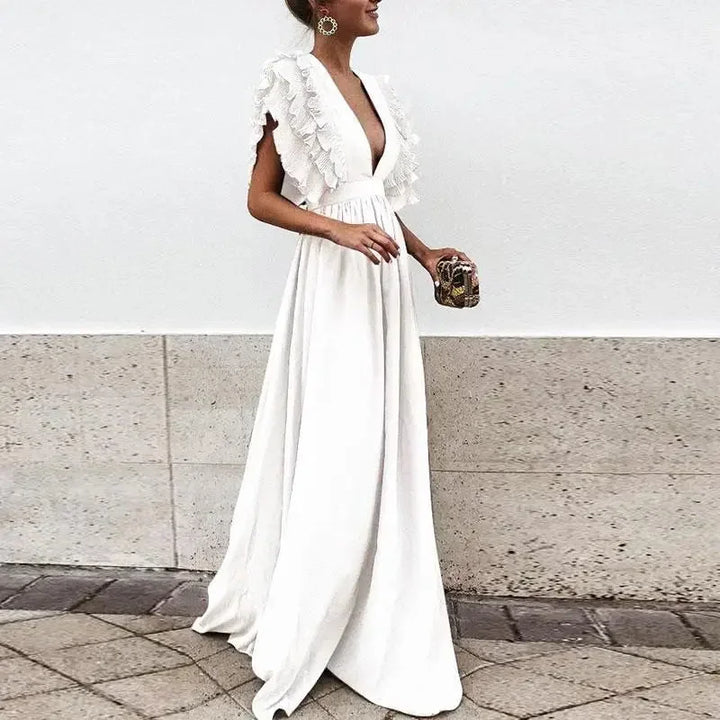 Nina - Women's long flowing dress with ruffled sleeves and a low neckline