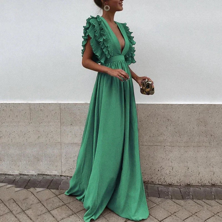 Nina - Women's long flowing dress with ruffled sleeves and a low neckline