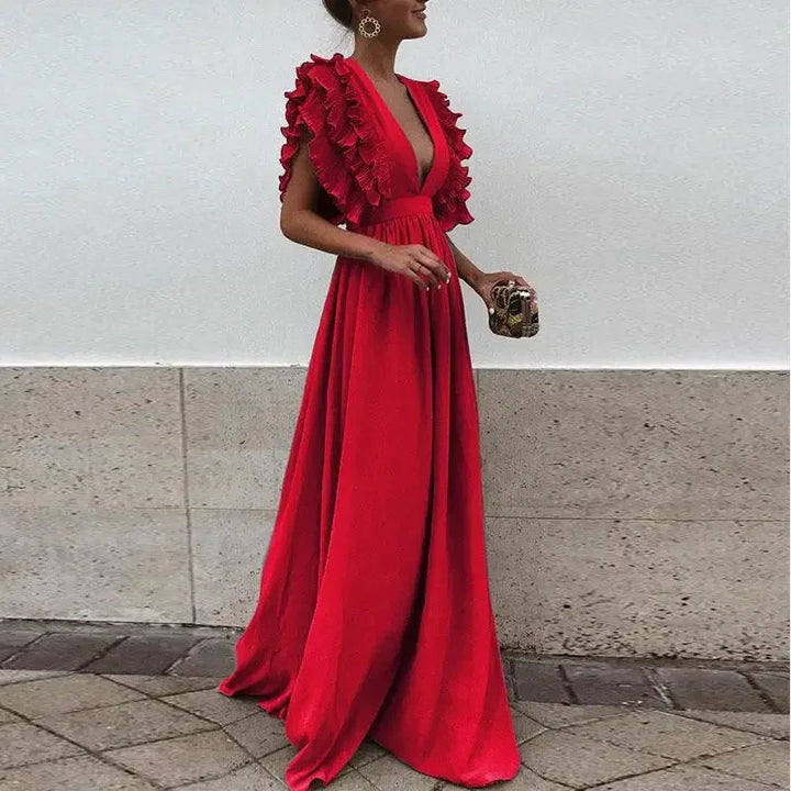 Nina - Women's long flowing dress with ruffled sleeves and a low neckline