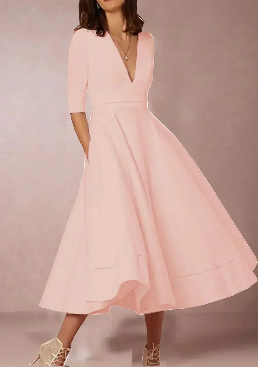 Daphne - Flared midi dress with V-neck, 3/4 sleeves and pockets