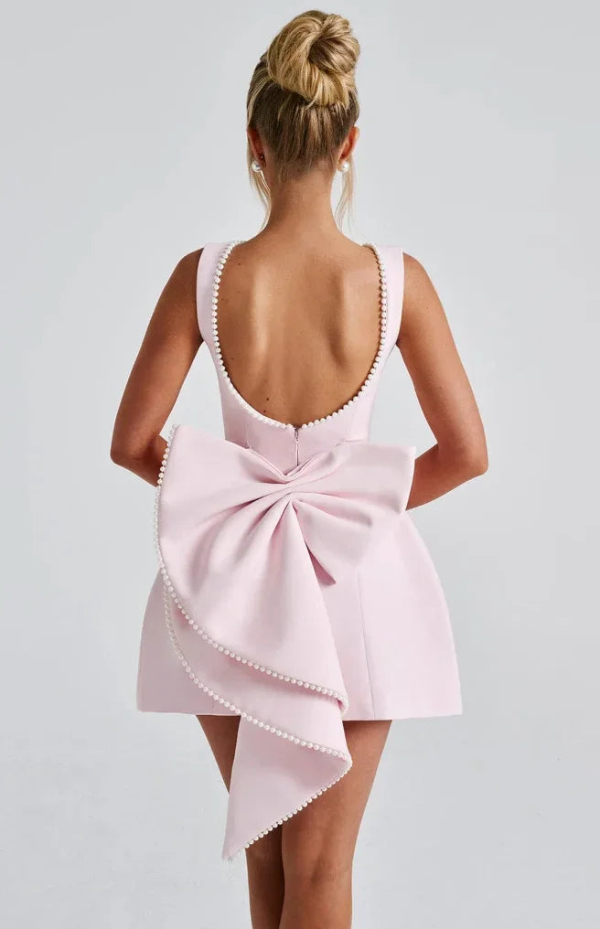 Noelle - Women's short backless dress with beaded accent and bow