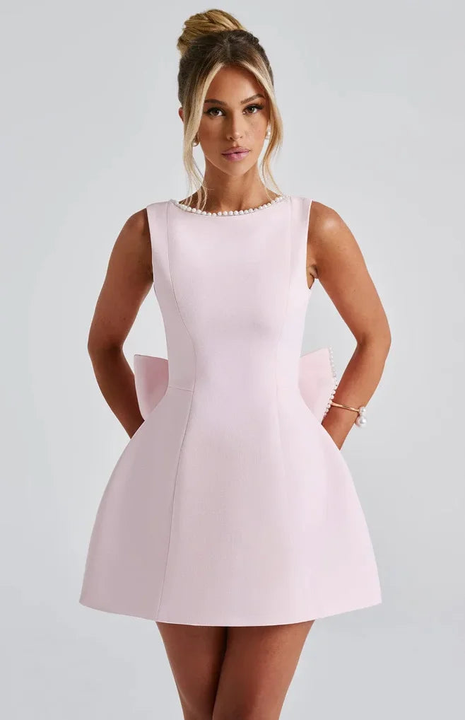 Noelle - Women's short backless dress with beaded accent and bow
