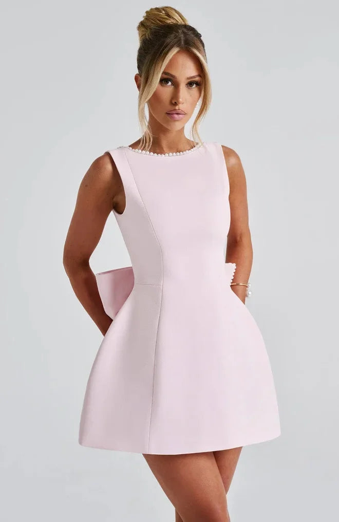 Noelle - Women's short backless dress with beaded accent and bow
