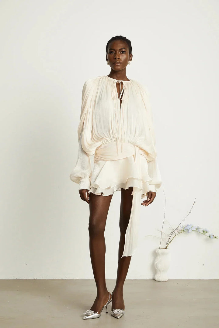 Deborah - Short flowing dress with long sleeves and a tied belt