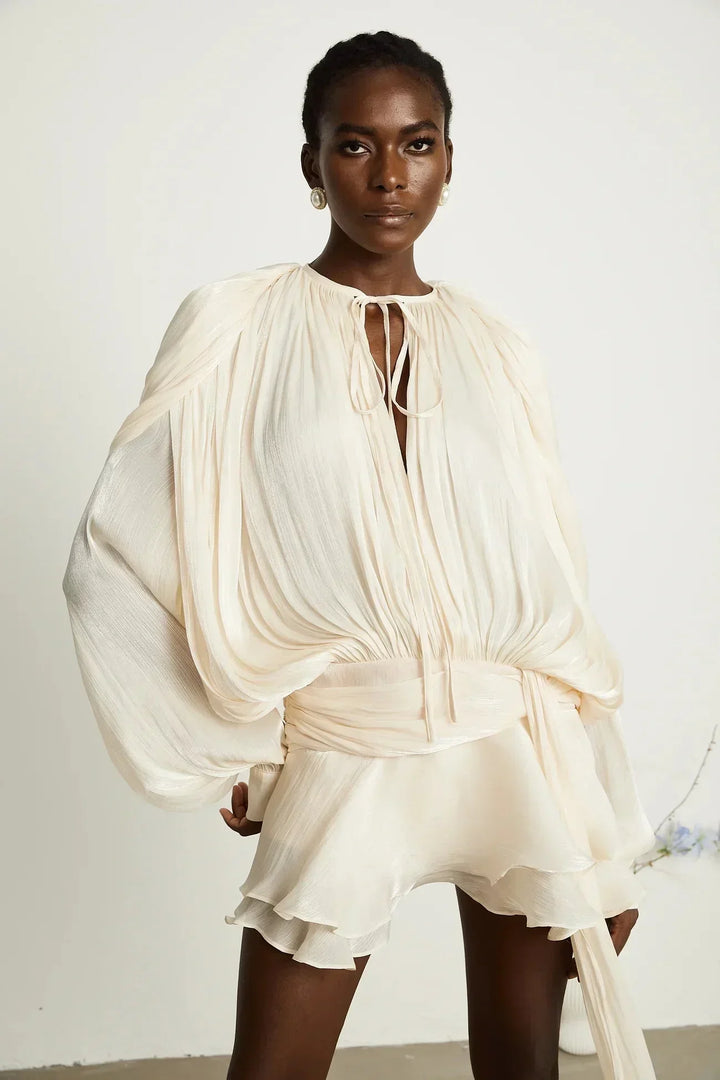Deborah - Short flowing dress with long sleeves and a tied belt
