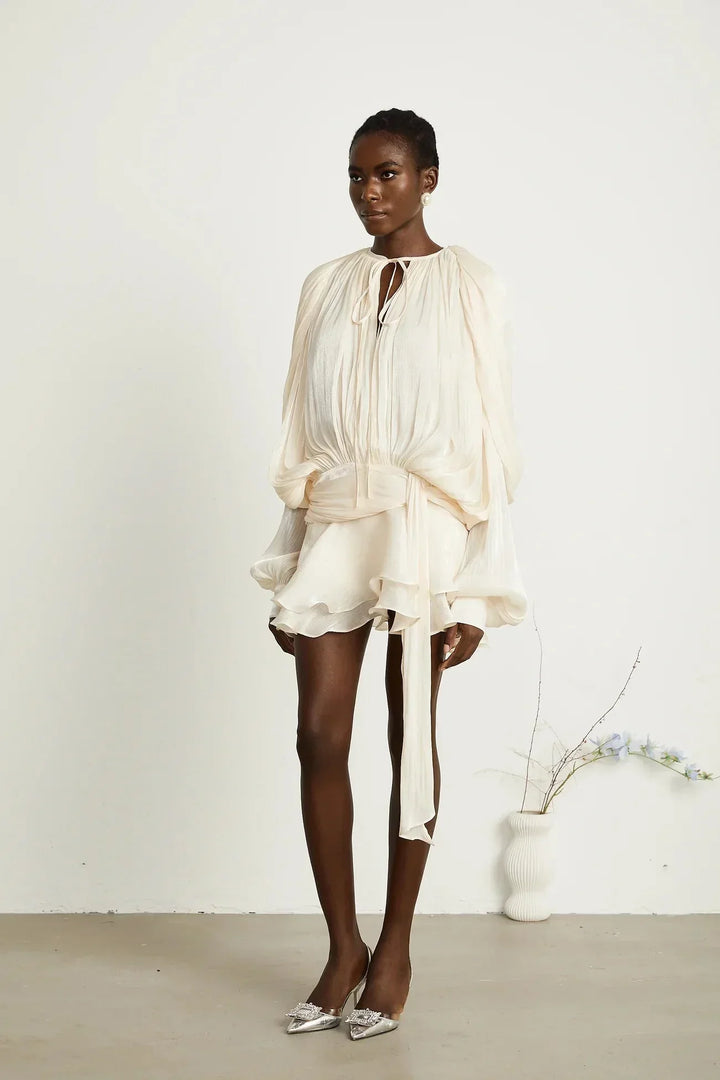 Deborah - Short flowing dress with long sleeves and a tied belt