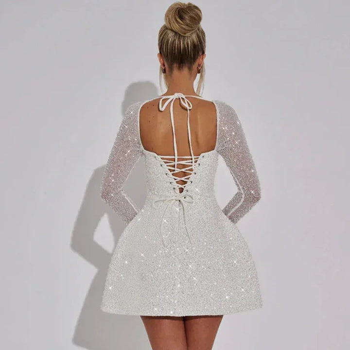 Mila - Women's short sparkly evening dress with long sleeves