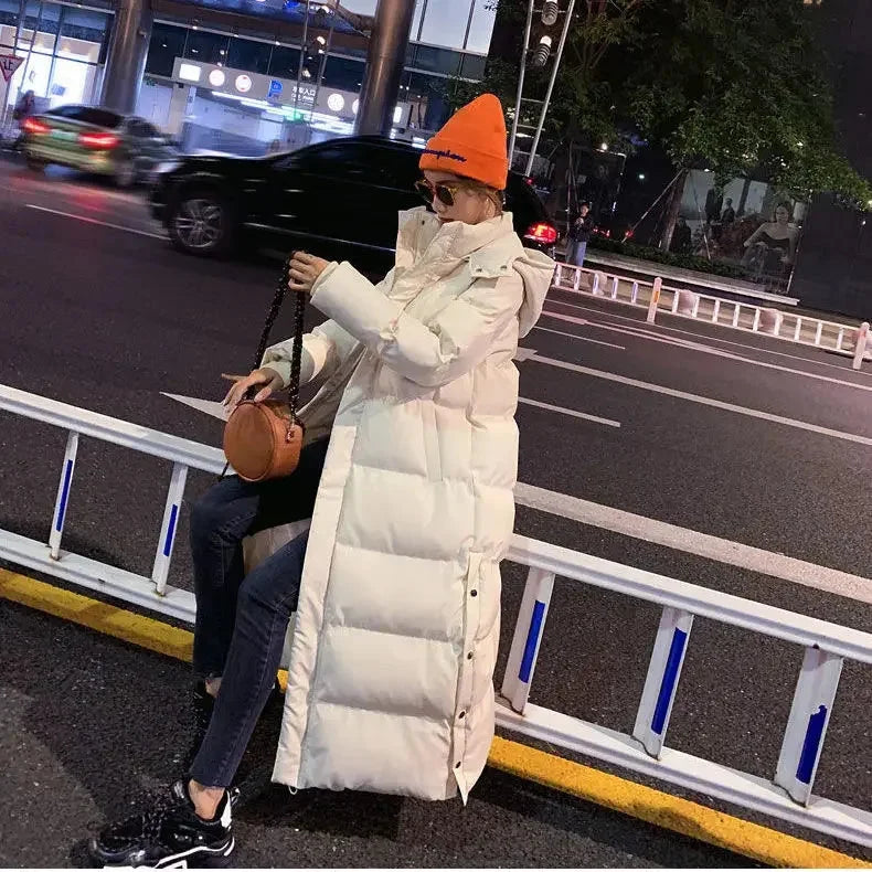 Xena - Women's long puffer jacket with removable hood