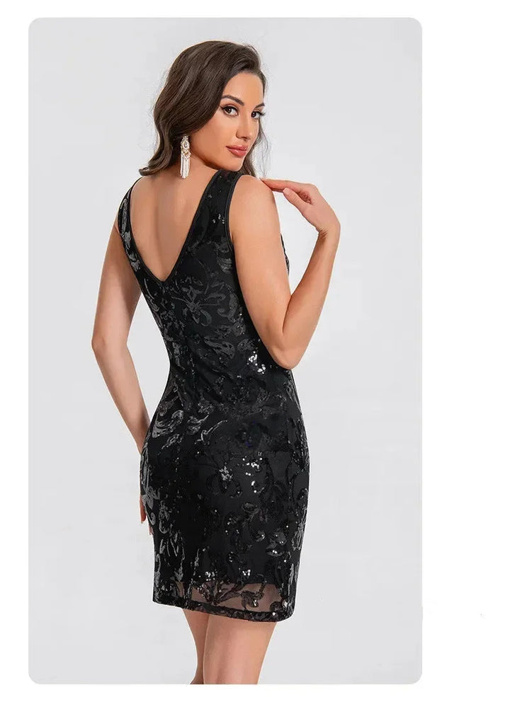 Women's fitted sleeveless sequin mini dress with mesh neckline