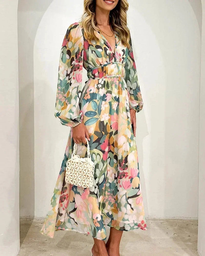 Women's floral maxi dress with long puff sleeves and v-neckline