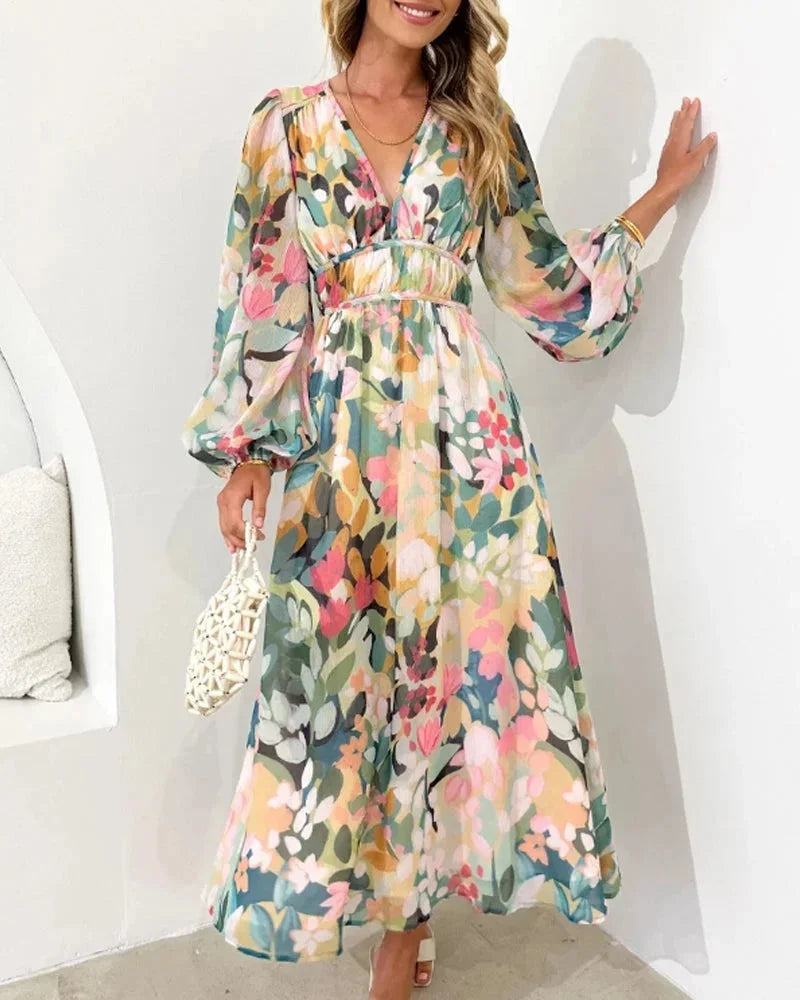 Women's floral maxi dress with long puff sleeves and v-neckline