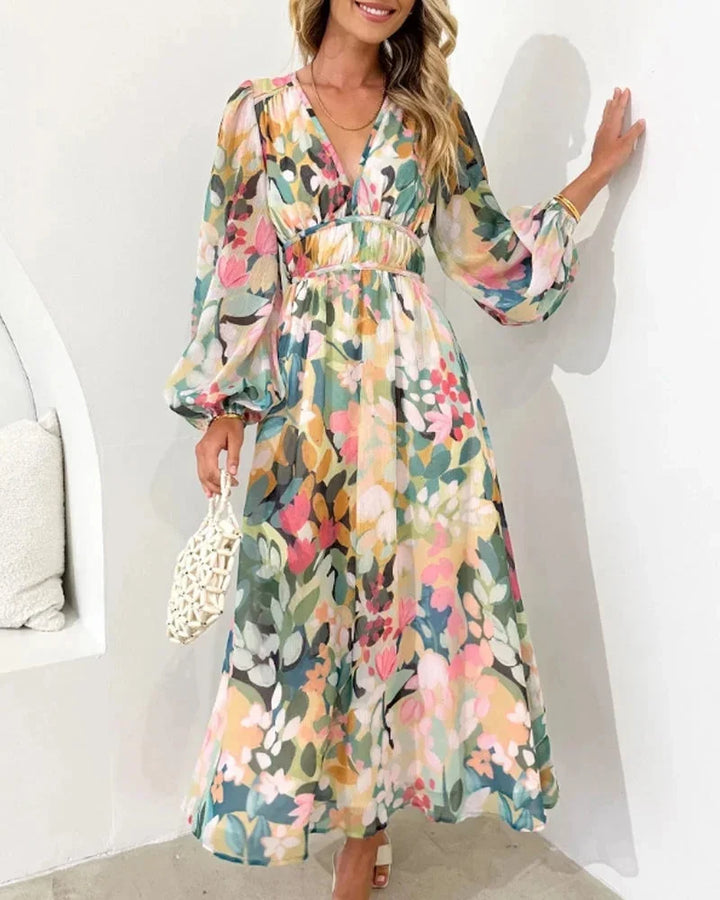 Women's floral maxi dress with long puff sleeves and v-neckline