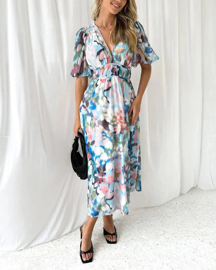 Women's floral maxi dress with long puff sleeves and v-neckline