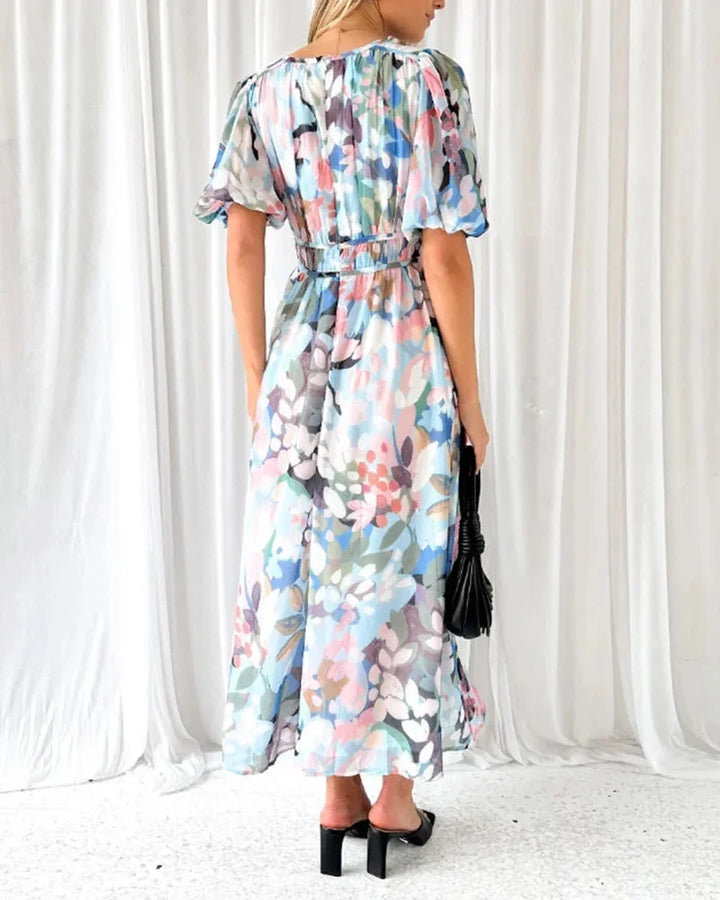 Women's floral maxi dress with long puff sleeves and v-neckline