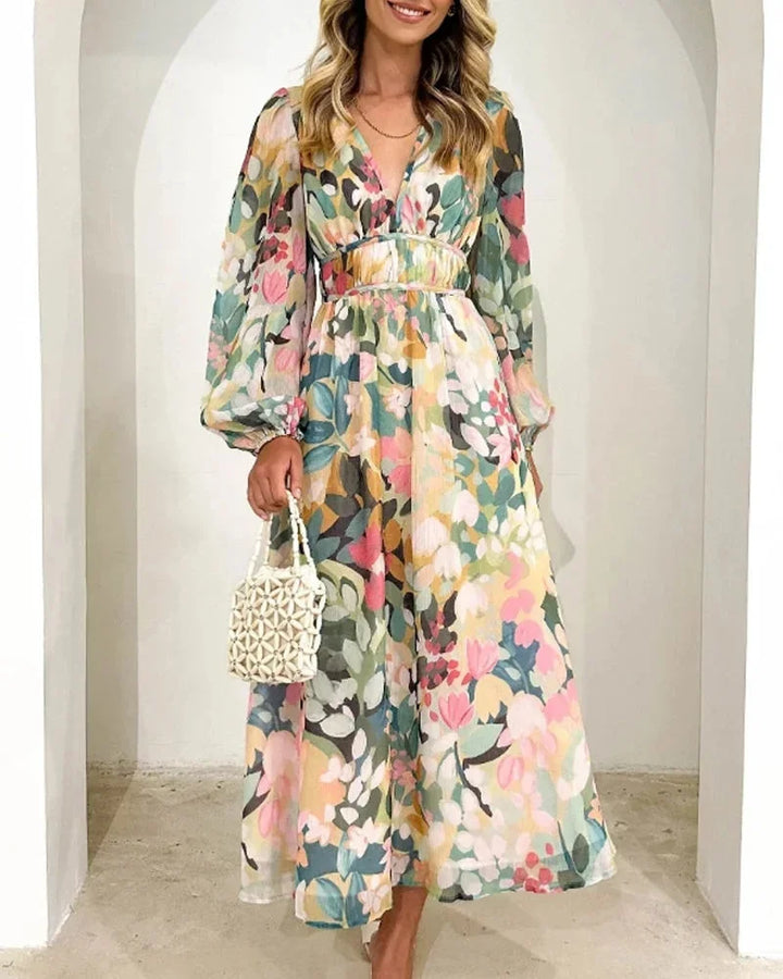 Women's floral maxi dress with long puff sleeves and v-neckline