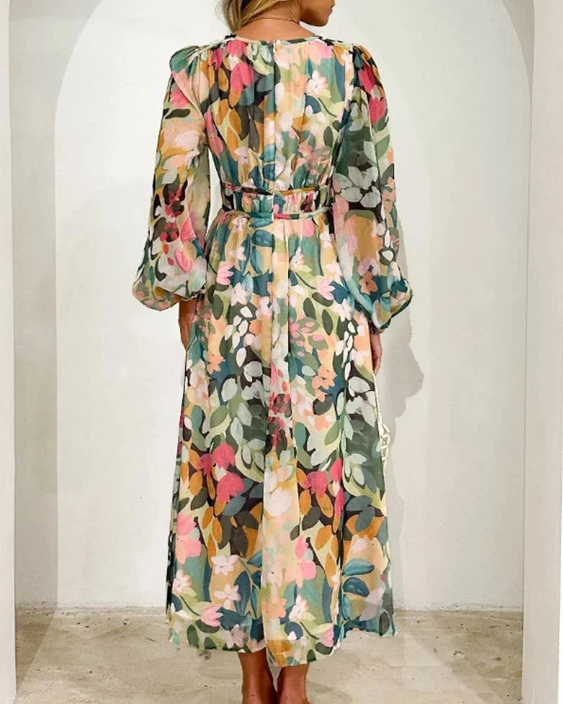 Women's floral maxi dress with long puff sleeves and v-neckline