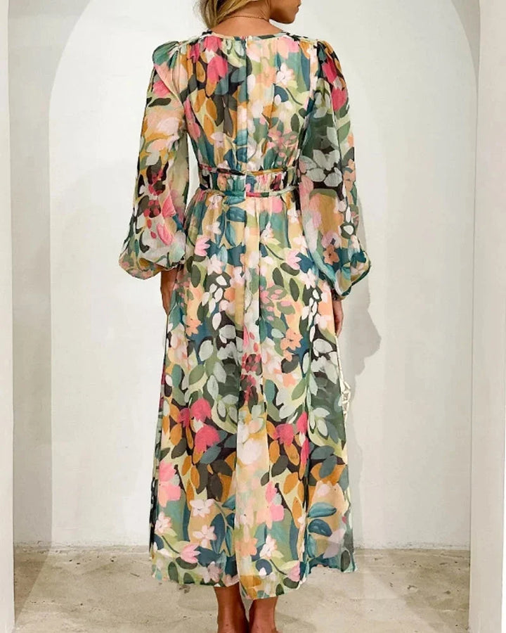 Women's floral maxi dress with long puff sleeves and v-neckline