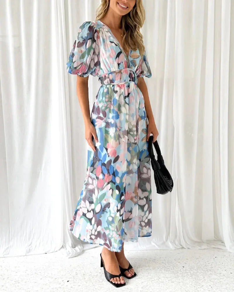 Women's floral maxi dress with long puff sleeves and v-neckline
