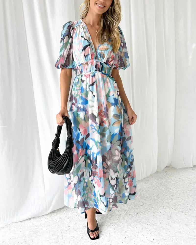 Women's floral maxi dress with long puff sleeves and v-neckline