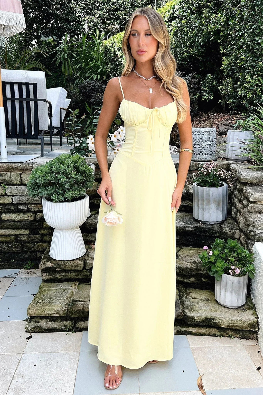 Women's flowy maxi dress with adjustable straps and sweetheart neckline