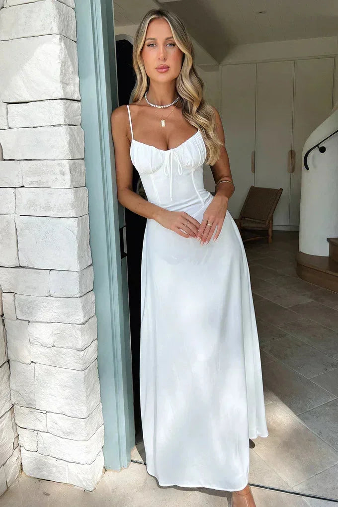 Women's flowy maxi dress with adjustable straps and sweetheart neckline