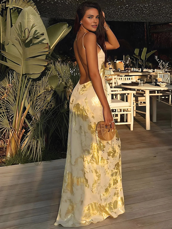 Women's gold satin maxi dress with foil details and straps