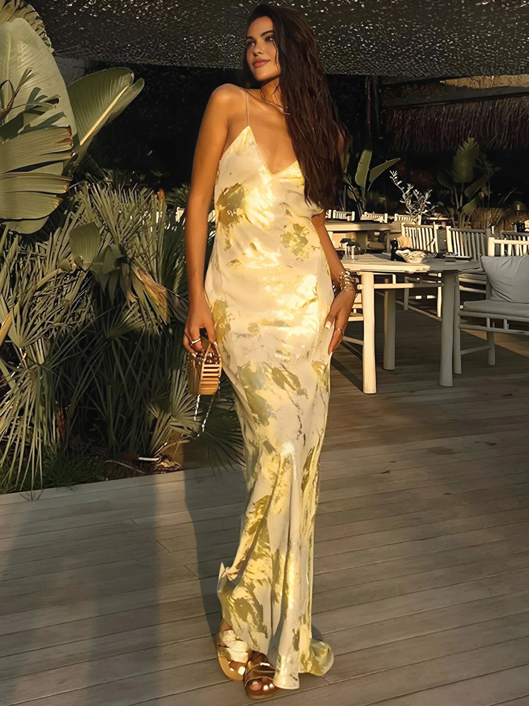 Women's gold satin maxi dress with foil details and straps