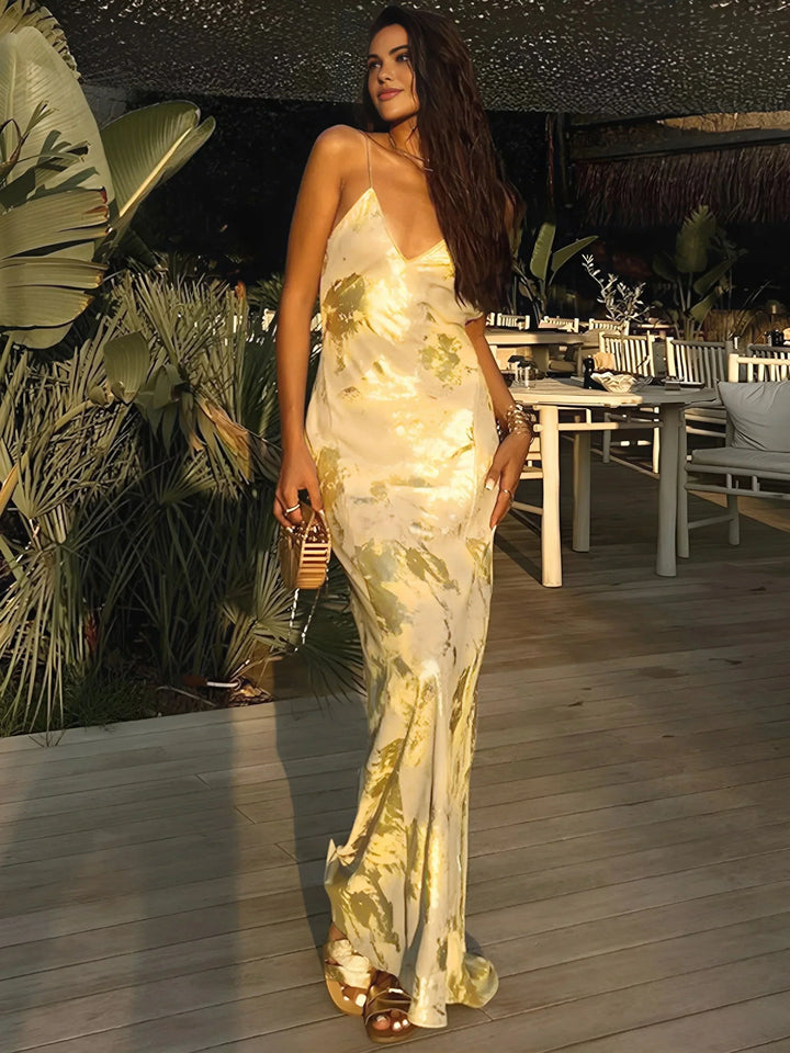 Women's gold satin maxi dress with foil details and straps