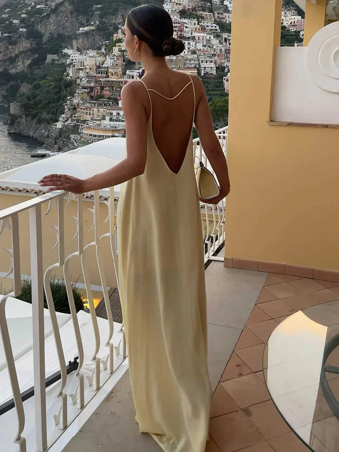 Women's yellow backless maxi dress with sleek straps